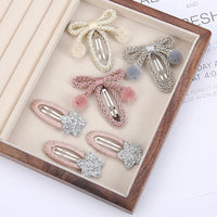 Sequin Star Bow BB Hair Clip — Braided Hairball Detail